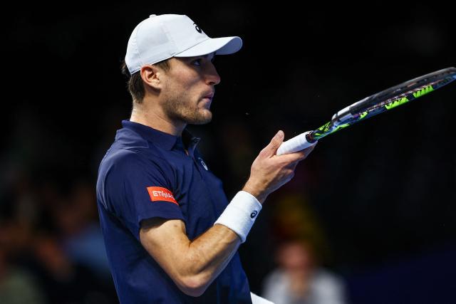 Belgium's Raphael Collignon reacts as he plays against Argentina's Francisco Comesana during the European Open ATP tennis tournament in Brussels, on October 15, 2025. (Photo by DAVID PINTENS / Belga / AFP) / Belgium OUT