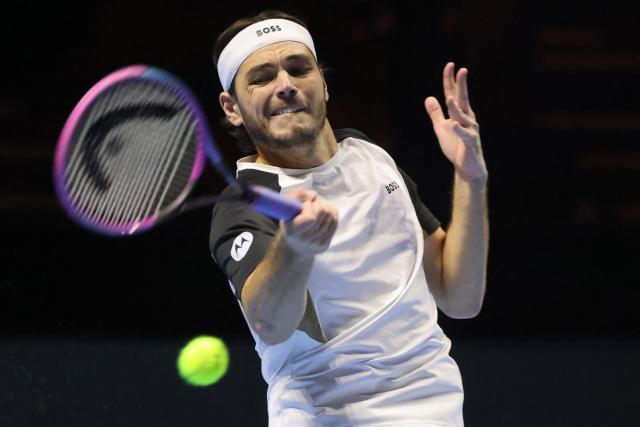 US' Taylor Fritz returns the ball to Germany's Alexander Zverev during the quarter-final of the Six Kings Slam exhibition tennis tournament in Riyadh on October 15, 2025. (Photo by Fayez NURELDINE / AFP)
