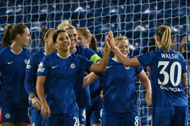 Chelsea's Scottish midfielder #08 Erin Cuthbert (C) celebrates scoring their fourth goal with Chelsea's Australian striker #20 Sam Kerr (L) and Chelsea's English midfielder #30 Keira Walsh (R) during the UEFA Women's Champions League, league phase football match between Chelsea and Paris FC at Stamford Bridge in London on October 15, 2025. (Photo by JUSTIN TALLIS / AFP)