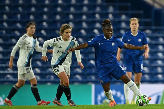 Chelsea's French striker #17 Sandy Baltimore (R) controls the ball under pressure from Paris FC's French defender #02 Celina Ould Hocine (2L) during the UEFA Women's Champions League, league phase football match between Chelsea and Paris FC at Stamford Bridge in London on October 15, 2025. (Photo by JUSTIN TALLIS / AFP)