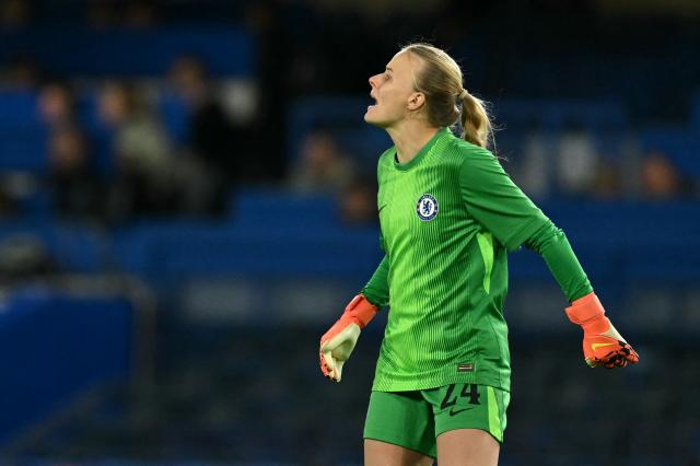 Chelsea's English goalkeeper #24 Hannah Hampton shouts during the UEFA Women's Champions League, league phase football match between Chelsea and Paris FC at Stamford Bridge in London on October 15, 2025. (Photo by JUSTIN TALLIS / AFP)