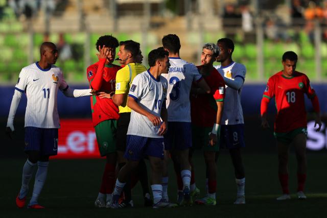 Players from both teams argue during the 2025 FIFA U-20 World Cup semi-final football match between Morocco and France at the Elias Figueroa Stadium in Valparaiso, Chile on October 15, 2025. (Photo by Javier TORRES / AFP)