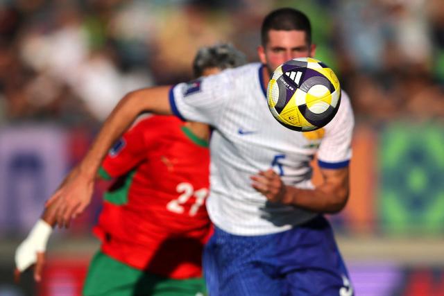 France's defender #05 Elyaz Zidane (front) and Morocco's forward #21 Yassir Zabiri fight for the ball during the 2025 FIFA U-20 World Cup semi-final football match between Morocco and France at the Elias Figueroa Stadium in Valparaiso, Chile on October 15, 2025. (Photo by Javier TORRES / AFP)