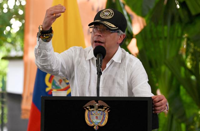 Colombia's President Gustavo Petro delivers a speech during a ceremony to destroy war material in Puerto Asis, Colombia on October 15, 2025. Petro said on october 15, 2025, he would boycott an upcoming US-supported Summit of the Americas, deepening a rift with Washington -- which has already stripped him of a US visa. (Photo by David SALAZAR / AFP)