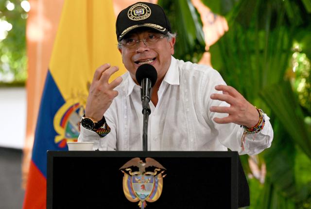 Colombia's President Gustavo Petro delivers a speech during a ceremony to destroy war material in Puerto Asis, Colombia on October 15, 2025. Petro said on october 15, 2025, he would boycott an upcoming US-supported Summit of the Americas, deepening a rift with Washington -- which has already stripped him of a US visa. (Photo by David SALAZAR / AFP)
