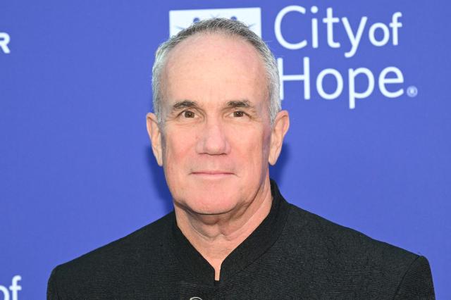 Warner Records COO Tom Corson, 2025 Spirit of Life Honoree, poses for photos during the City of Hope's 2025 Spirit of Life Gala in Los Angeles, California, October 15, 2025. (Photo by Robyn Beck / AFP)