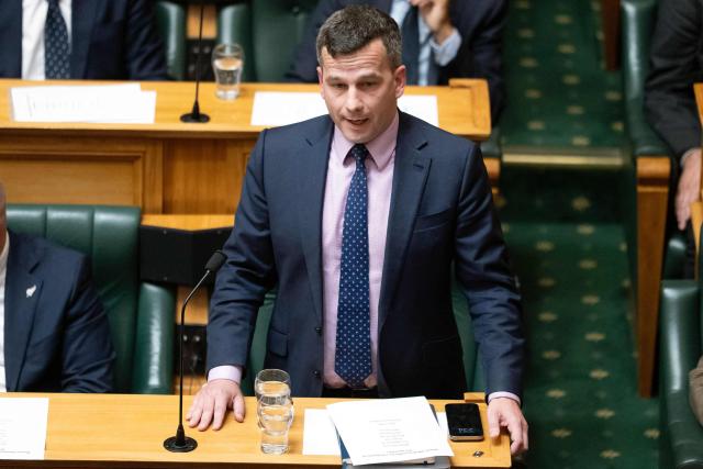 New Zealand's Deputy Prime Minister and leader of the ACT party David Seymour speaks in the house about former New Zealand prime minister Jim Bolger after his death, at Parliament in Wellington on October 16, 2025. (Photo by Marty MELVILLE / AFP)