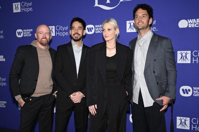 Members of US rock band Linkin Park (L/R) Dave Farrell, Mike Shinoda, Emily Armstrong and Colin Brittain attend City of Hope's 2025 Spirit of Life Gala at the Pacific Design Center in West Hollywood, California, on October 15, 2025. (Photo by Robyn Beck / AFP)
