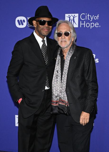 US musician, producer and songwriter Jimmy Jam (L) and former President and CEO of The Recording Academy Neil Portnow attend City of Hope's 2025 Spirit of Life Gala at the Pacific Design Center in West Hollywood, California, on October 15, 2025. (Photo by Robyn Beck / AFP)