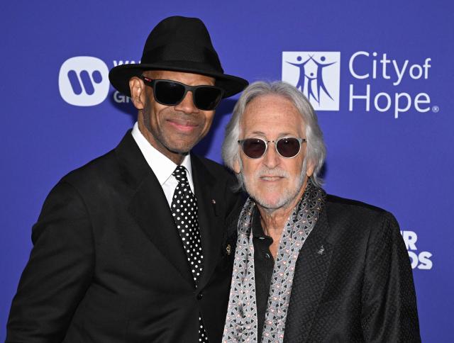 US musician, producer and songwriter Jimmy Jam (L) and former President and CEO of The Recording Academy Neil Portnow attend City of Hope's 2025 Spirit of Life Gala at the Pacific Design Center in West Hollywood, California, on October 15, 2025. (Photo by Robyn Beck / AFP)