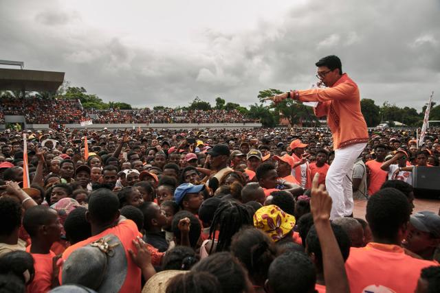 (FILES) Incumbent Madagascar President Andry Rajoelina, candidate in the 2023 presidential election, speaks at a political rally during his re-election campaign, in Mahanoro, November 11, 2023. Madagascar's ousted president confirmed for the first time that he had fled the country, issuing a statement after a military-led power grab prompted by weeks of demonstrations that have plunged the island nation into crisis.
President Andry Rajoelina left between October 11 and 12 after "explicit and extremely serious threats were made against the life of the Head of State," the presidency said in a statement late Wednesday. (Photo by RIJASOLO / AFP)