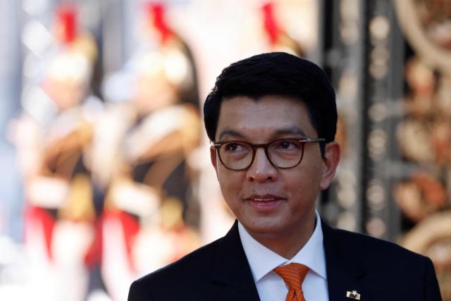(FILES) Madagascar president Andry Rajoelina arrives to attend the opening session of the 19th Summit of the Francophonie at the Grand Palais in Paris, on October 5, 2024. Madagascar's ousted president confirmed for the first time that he had fled the country, issuing a statement after a military-led power grab prompted by weeks of demonstrations that have plunged the island nation into crisis.
President Andry Rajoelina left between October 11 and 12 after "explicit and extremely serious threats were made against the life of the Head of State," the presidency said in a statement late Wednesday. (Photo by Ludovic MARIN / POOL / AFP)