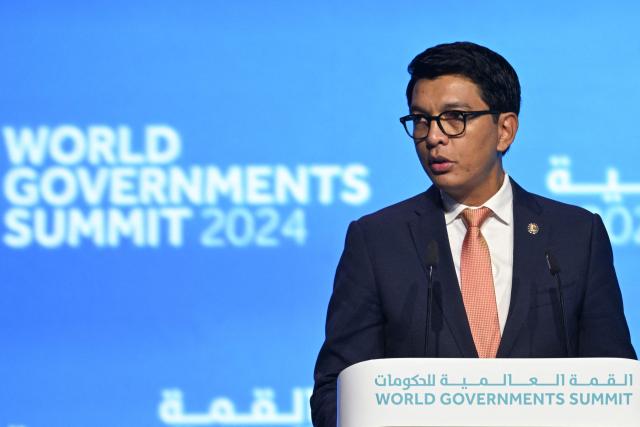 (FILES) Madagascar's President Andry Rajoelina speaks during the World Government Summit in Dubai on February 13, 2024. Madagascar's ousted president confirmed for the first time that he had fled the country, issuing a statement after a military-led power grab prompted by weeks of demonstrations that have plunged the island nation into crisis.
President Andry Rajoelina left between October 11 and 12 after "explicit and extremely serious threats were made against the life of the Head of State," the presidency said in a statement late Wednesday. (Photo by Ryan LIM / AFP)