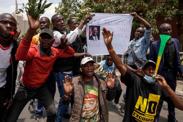 Supporters and mourners of Kenyan opposition leader Raila Odinga gather at the Kenya Parliament in Nairobi on October 16, 2025 ahead of the arrival of Odinga's body following his death at the age of 80 during a health visit to India. Kenyan opposition leader Raila Odinga has died at the age of 80 during a health visit to India, local police said on October 15, 2025.
Odinga was the perennial opposition figure of Kenyan politics, running unsuccessfully for the presidency on five occasions, most recently in 2022. 
He remained a dominant force, able to rally huge numbers, particularly from his native western Kenya. (Photo by SIMON MAINA / AFP)