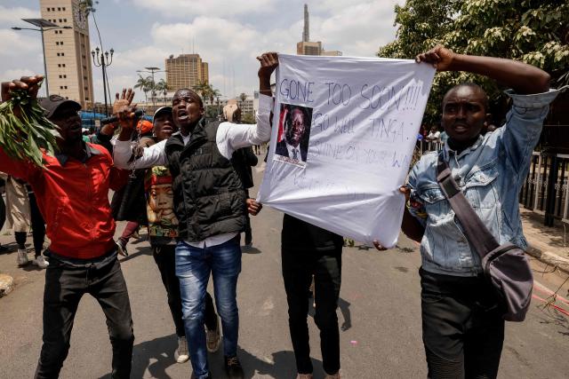 Supporters and mourners of Kenyan opposition leader Raila Odinga gather at the Kenya Parliament in Nairobi on October 16, 2025 ahead of the arrival of Odinga's body following his death at the age of 80 during a health visit to India. Kenyan opposition leader Raila Odinga has died at the age of 80 during a health visit to India, local police said on October 15, 2025.
Odinga was the perennial opposition figure of Kenyan politics, running unsuccessfully for the presidency on five occasions, most recently in 2022. 
He remained a dominant force, able to rally huge numbers, particularly from his native western Kenya. (Photo by SIMON MAINA / AFP)