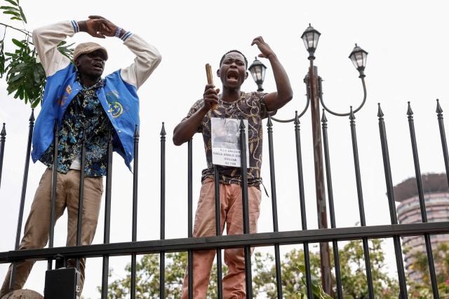 Supporters and mourners of Kenyan opposition leader Raila Odinga gather at the Kenya Parliament in Nairobi on October 16, 2025 ahead of the arrival of Odinga's body following his death at the age of 80 during a health visit to India. Kenyan opposition leader Raila Odinga has died at the age of 80 during a health visit to India, local police said on October 15, 2025.
Odinga was the perennial opposition figure of Kenyan politics, running unsuccessfully for the presidency on five occasions, most recently in 2022. 
He remained a dominant force, able to rally huge numbers, particularly from his native western Kenya. (Photo by SIMON MAINA / AFP)