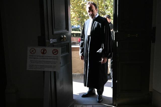 Alexandre Martin, one of the lawyers for defendant Cedric Jubillar, arrives for the trial of Cedric Jubillar, accused of the disappearance of Delphine Jubillar, in the courtroom of the Tarn Assize Courthouse in Albi, southwestern France, on October 16, 2025. Cedric Jubillar, a 38-year-old construction worker accused of causing the disappearance of his wife Delphine, who wanted to leave him, on the night of December 15-16, 2020, appears before the Tarn Assize Court from September 22 to October 17. Since the beginning of this case, with no body, no witnesses, and no confession, Cedric Jubillar has maintained his innocence. A thirty-year prison sentence is sought against Cedric Jubillar, on October 15, 2025. (Photo by Lionel BONAVENTURE / AFP)