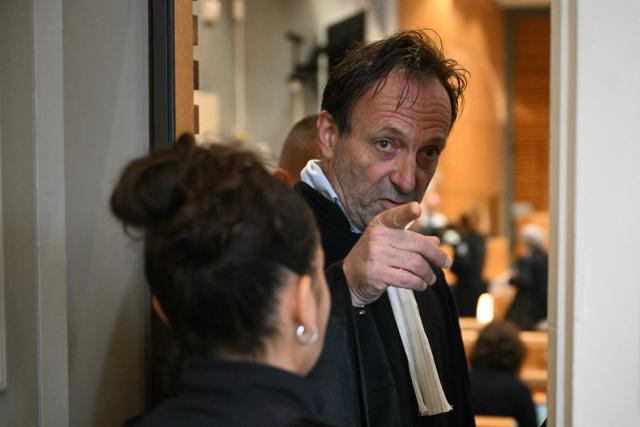 Alexandre Martin, one of the lawyers for defendant Cedric Jubillar, gestures during the trial of Cedric Jubillar, accused of the disappearance of Delphine Jubillar, in the courtroom of the Tarn Assize Courthouse in Albi, southwestern France, on October 16, 2025. Cedric Jubillar, a 38-year-old construction worker accused of causing the disappearance of his wife Delphine, who wanted to leave him, on the night of December 15-16, 2020, appears before the Tarn Assize Court from September 22 to October 17. Since the beginning of this case, with no body, no witnesses, and no confession, Cedric Jubillar has maintained his innocence. A thirty-year prison sentence is sought against Cedric Jubillar, on October 15, 2025. (Photo by Lionel BONAVENTURE / AFP)