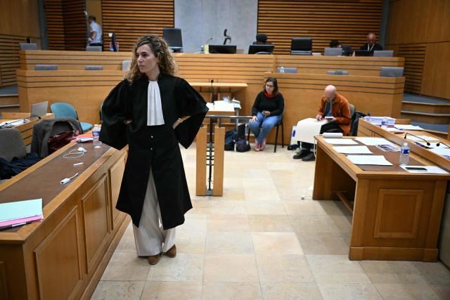 Emmanuelle Franck, one of the lawyers for defendant Cedric Jubillar, waits for the opening of the trial of Cedric Jubillar, accused of the disappearance of Delphine Jubillar, in the courtroom of the Tarn Assize Courthouse in Albi, southwestern France, on October 16, 2025. Cedric Jubillar, a 38-year-old construction worker accused of causing the disappearance of his wife Delphine, who wanted to leave him, on the night of December 15-16, 2020, appears before the Tarn Assize Court from September 22 to October 17. Since the beginning of this case, with no body, no witnesses, and no confession, Cedric Jubillar has maintained his innocence. A thirty-year prison sentence is sought against Cedric Jubillar, on October 15, 2025. (Photo by Lionel BONAVENTURE / AFP)