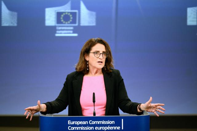 (LtoR) EU Executive Vice-President for Clean, Just and Competitive Transition Teresa Ribera gestures during a press conference on an EU global climate and energy vision at the EU headquarters in Brussels on October 16, 2025. (Photo by Nicolas TUCAT / AFP)