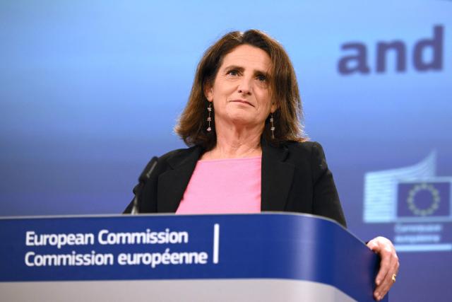 (LtoR) EU Executive Vice-President for Clean, Just and Competitive Transition Teresa Ribera looks on during a press conference on an EU global climate and energy vision at the EU headquarters in Brussels on October 16, 2025. (Photo by Nicolas TUCAT / AFP)