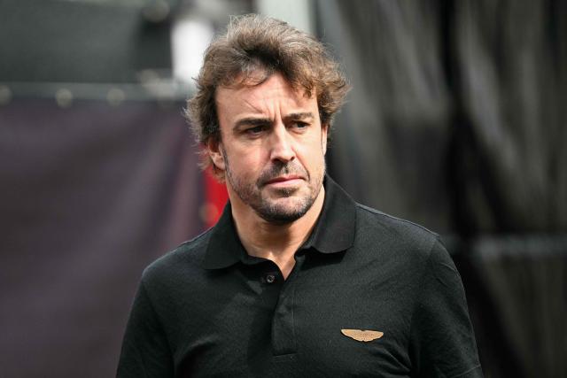 Aston Martin's Spanish driver Fernando Alonso arrives in the paddock ahead of the United States Formula One Grand Prix at the Circuit of the Americas in Austin, Texas, on October 16, 2025. (Photo by Jim WATSON / AFP)