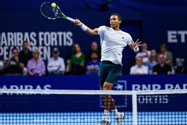 Canada's Felix Auger-Aliassime plays a forehand return to Bosnia Herzegovina's Damir Dzumhur during their men's single match of the European Open ATP tennis tournament in Brussels, on October 16, 2025. (Photo by DAVID PINTENS / Belga / AFP) / Belgium OUT