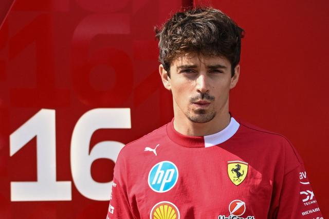 Ferrari's Monegasque driver Charles Leclerc arrives in the paddock ahead of the United States Formula One Grand Prix at the Circuit of the Americas in Austin, Texas, on October 16, 2025. (Photo by RONALDO SCHEMIDT / AFP)