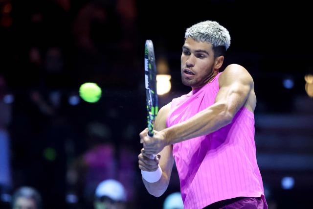 Spain's Carlos Alcaraz returns a shot against the US' Taylor Fritz during the semi-final of the Six Kings Slam exhibition tennis tournament in Riyadh on October 16, 2025. (Photo by Fayez NURELDINE / AFP)