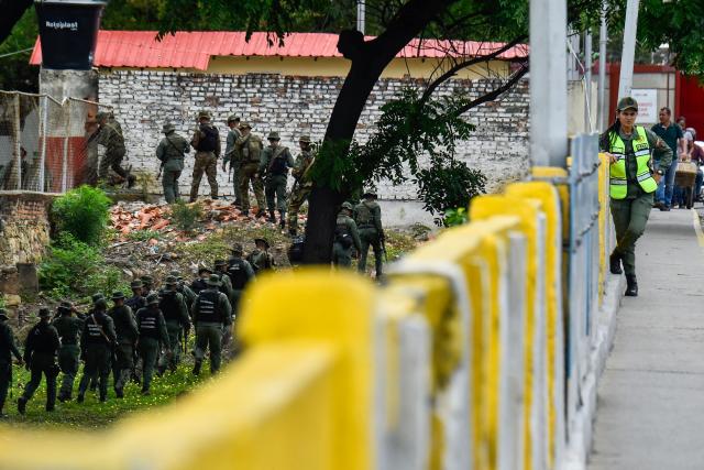 Venezuelan military patrol at the Simon Bolivar International Bridge at the Colombia-Venezuela border in Villa del Rosario, Colombia on October 16, 2025. Following statements by the United States regarding possible ground operations with CIA support, the Venezuelan government deployed military forces to the border area around the Simon Bolívar International Bridge between San Antonio and Villa del Rosario. Heavily armed troops from the Bolivarian Army and Bolivarian National Guard are stationed in the area, guarding the border crossing in response to what Caracas considers a threat. (Photo by Schneyder Mendoza / AFP)