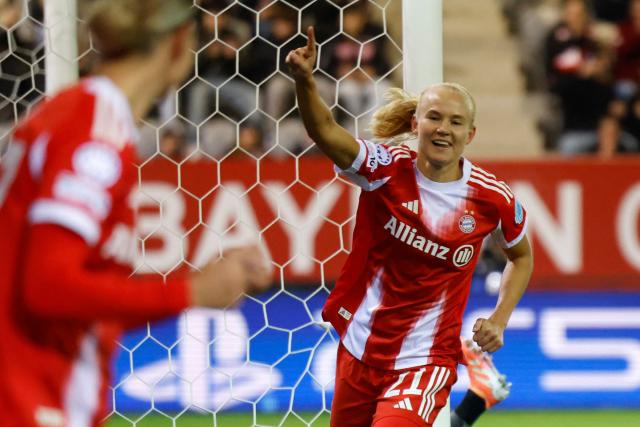 Bayern Munich's Danish forward #21 Pernille Harder celebrates after scoring the opening 1-0 goal during the UEFA Women's Champions League, league phase football match between FC Bayern Munich and Juventus in Munich, southern Germany, on October 16, 2025. (Photo by Michaela STACHE / AFP)