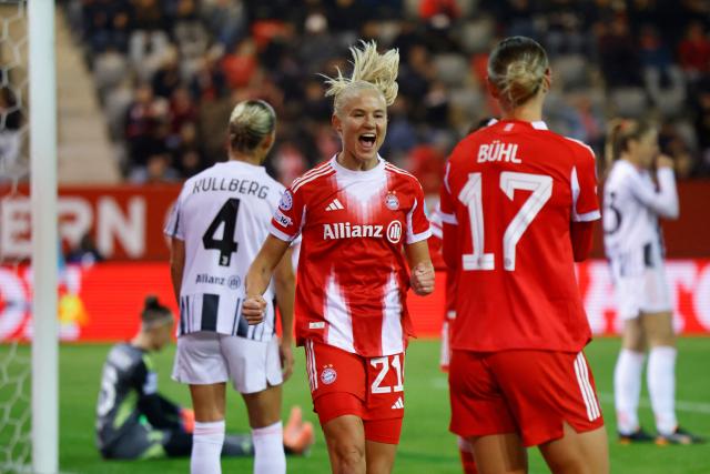 Bayern Munich's Danish forward #21 Pernille Harder (c) celebrates after scoring the opening 1-0 goal during the UEFA Women's Champions League, league phase football match between FC Bayern Munich and Juventus in Munich, southern Germany, on October 16, 2025. (Photo by Michaela STACHE / AFP)