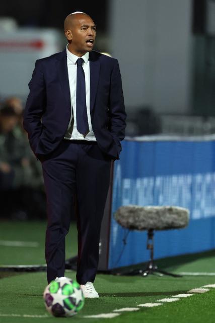 Paris Saint-Germain's Brazilian coach Paulo Cesar reacts during the UEFA Women's Champions League first round day 2 football match between Paris Saint-Germain (PSG) and Real Madrid at the Campus Paris Saint-Germain in Poissy, western Paris on October 16, 2025. (Photo by Franck FIFE / AFP)