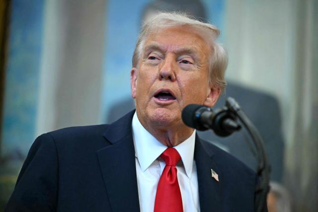 US President Donald Trump makes an announcement in the Oval Office of the White House in Washington, DC, on October 16, 2025. (Photo by ANDREW CABALLERO-REYNOLDS / AFP)