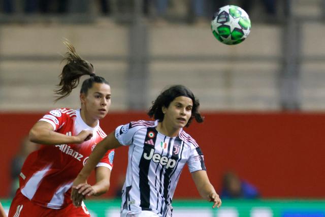 Juventus' Italian midfielder #06 Eva Schatzer (R) and Bayern Munich's German midfielder #08 Lena Oberdorf vie for the ball during the UEFA Women's Champions League, league phase football match between FC Bayern Munich and Juventus in Munich, southern Germany, on October 16, 2025. (Photo by Michaela STACHE / AFP)