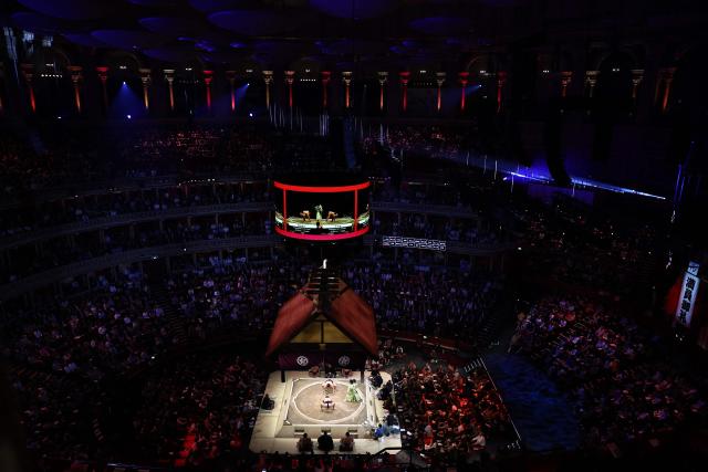 Hiradoumi faces Atamifuji during their bout on day 2 of the Grand Sumo Tournament at the Royal Albert Hall in central London on October 16, 2025. (Photo by HENRY NICHOLLS / AFP)