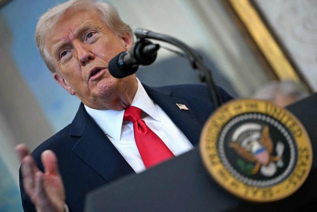 US President Donald Trump makes an announcement in the Oval Office of the White House in Washington, DC, on October 16, 2025. (Photo by ANDREW CABALLERO-REYNOLDS / AFP)
