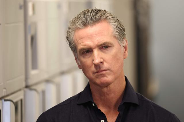 California Governor Gavin Newsom listens before speaking during a press conference announcing $11 insulin and prescription drugs with the CalRX program inside a Cedars-Sinai pharmacy in Los Angeles, California on October 16, 2025. (Photo by Patrick T. Fallon / AFP)