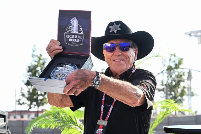 Italian-American retired racing driver Mario Andretti attends a ceremony announcing that Turn 20 at the Circuit of the Americas has been officially dedicated to him, ahead of the United States Formula One Grand Prix at the Circuit of the Americas in Austin, Texas, on October 16, 2025. (Photo by RONALDO SCHEMIDT / AFP)