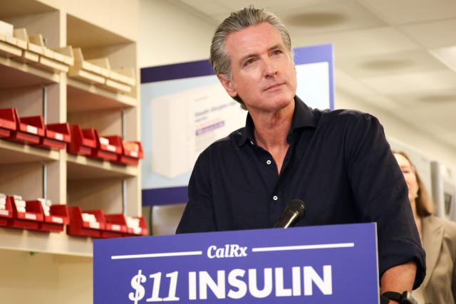 California Governor Gavin Newsom listens to a question during a press conference announcing $11 insulin and prescription drugs with the CalRX program inside a Cedars-Sinai pharmacy in Los Angeles, California on October 16, 2025. (Photo by Patrick T. Fallon / AFP)