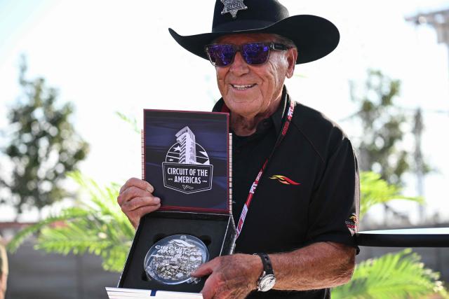 Italian-American retired racing driver Mario Andretti attends a ceremony announcing that Turn 20 at the Circuit of the Americas has been officially dedicated to him, ahead of the United States Formula One Grand Prix at the Circuit of the Americas in Austin, Texas, on October 16, 2025. (Photo by RONALDO SCHEMIDT / AFP)