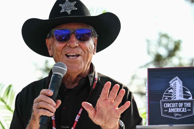Italian-American retired racing driver Mario Andretti speaks during a ceremony announcing that Turn 20 at the Circuit of the Americas has been officially dedicated to him, ahead of the United States Formula One Grand Prix at the Circuit of the Americas in Austin, Texas, on October 16, 2025. (Photo by RONALDO SCHEMIDT / AFP)