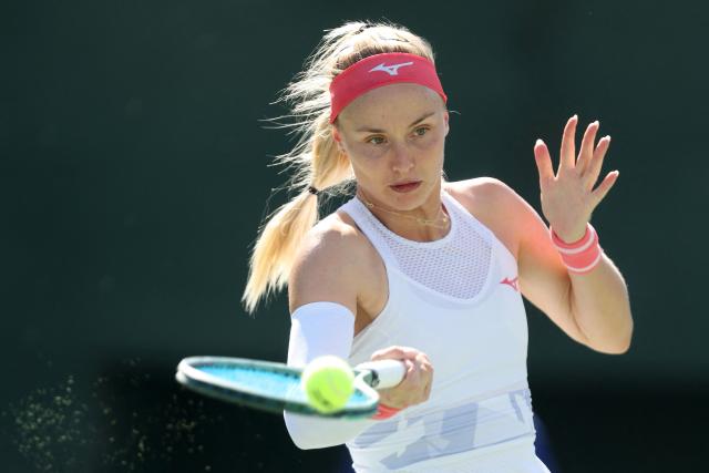 Slovakia's Rebecca Sramkova hits a return to Canada's Leylah Fernandez during their women's singles quarter-final match at the Japan Open tennis tournament in Osaka on October 17, 2025. (Photo by PAUL MILLER / AFP)
