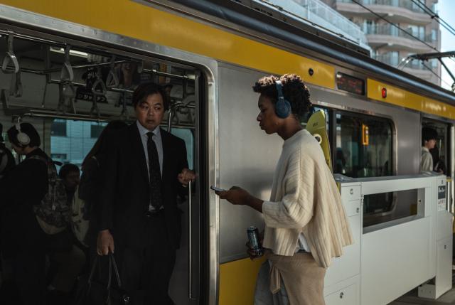 People commute from Ryogoku station in Tokyo on October 17, 2025. (Photo by Philip FONG / AFP)