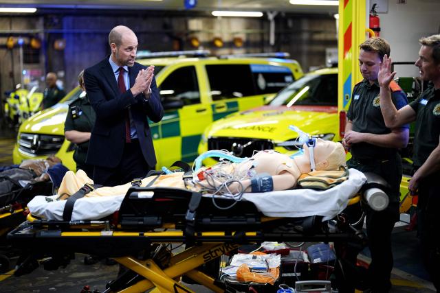 Britain's Prince William, Prince of Wales takes part in a training demonstration, during a visit to the London Ambulance Service's headquarters in London, on October 17, 2025. (Photo by Aaron Chown / POOL / AFP)