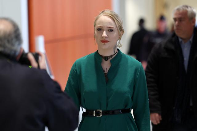 (FILES) Influencer Mila arrives for a hearing in the so-called "Mila case" trial, where six new defendants face charges of online harassment and death threats against the then teenager who posted social media tirades against Islam in Paris on April 11, 2022. Influencer Mila will appear for racial insult before the courthouse of Lyon on October 21, 2025. (Photo by Thomas COEX / AFP)