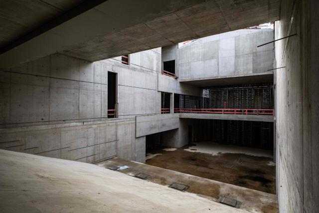 View of the main atrium of the Museum of the 20th Century at Berlin's Kulturforum, on the occasion of a topping-out ceremony at the site in Berlin on October 17, 2025. The building, designed by architect firm Herzog & de Meuron, will offer 9.000 m2 of exhibition space for art from the second half of the 20th century and will be linked through an underground passage to Mies van der Rohe's Neue Nationalgalerie modern art museum. (Photo by John MACDOUGALL / AFP)