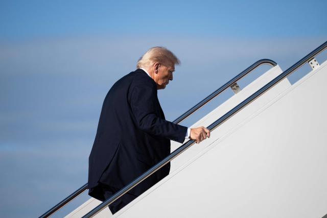 US President Donald Trump boards Air Force One prior to departure from Joint Base Andrews in Maryland, October 17, 2025, as he travels to Mar-a-lago for the weekend. Trump is headed to Palm Beach, Florida where he will spend the weekend at his Mar-a-Lago residence. (Photo by SAUL LOEB / AFP)
