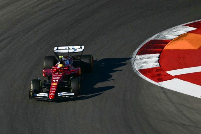 Ferrari's British driver Lewis Hamilton races during the Sprint Qualifying ahead of the United States Formula One Grand Prix at the Circuit of the Americas in Austin, Texas, on October 17, 2025. (Photo by Jim WATSON / AFP)