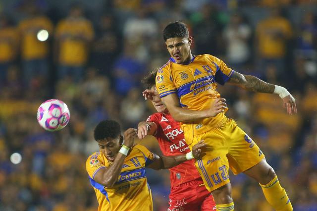 Tigres' Brazilian defender #02 Joaquim Henrique (L), Brazilian midfielder #23 Romulo Zwarg and Necaxa's midfielder #08 Agustin Palavecino fight for the ball during the Liga MX Apertura tournament football match between Tigres and Necaxa at the University stadium -aka El Volcan- in San Nicolas de los Garza, Nuevo Leon, Mexico on October 17, 2025. (Photo by Julio Cesar AGUILAR / AFP)